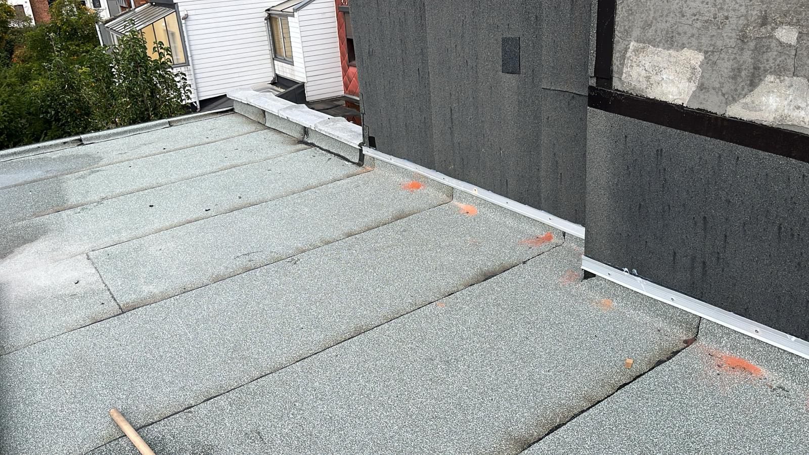 Plat dak renovatie met EPDM roofing - rijwoning