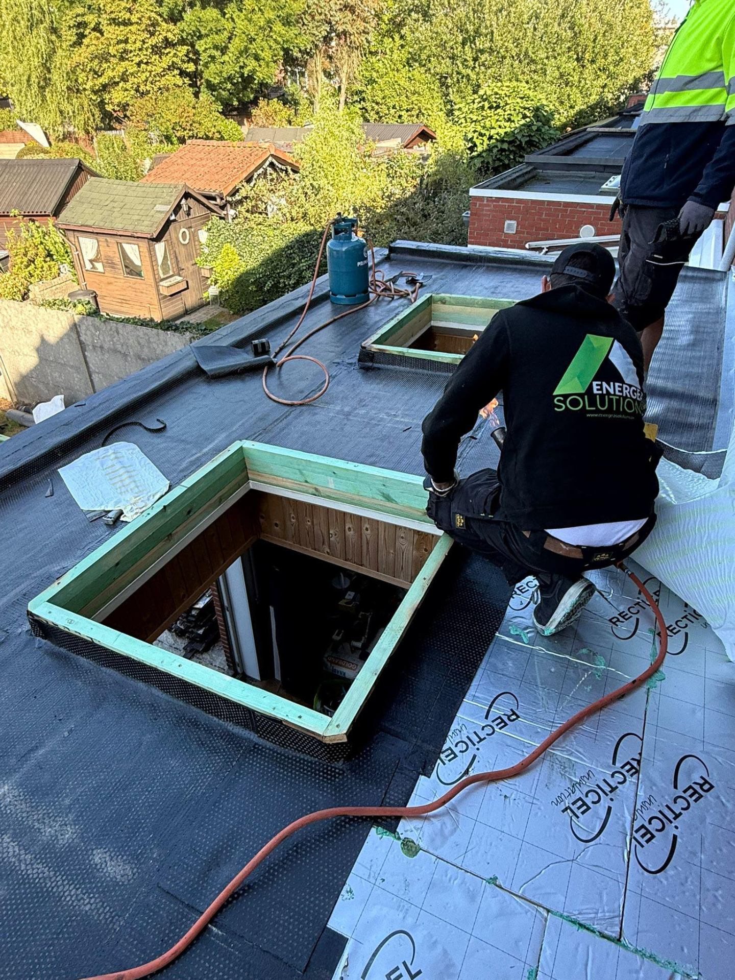 Plat dak werkzaamheden - open bebouwing